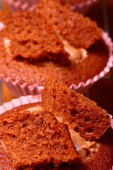 Home baked chocolate cup cakes cooling on a rack