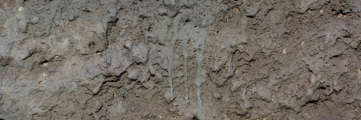 old cement plaster with traces of destruction. Web banner.
