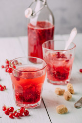Infused water with red currant and sugar