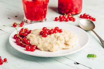 Simple breakfast with porridge and infused water