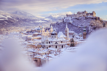 Fototapeta na wymiar Panorama of Salzburg in winter: Snowy historical center, sunshine