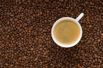 cup of coffee with beans