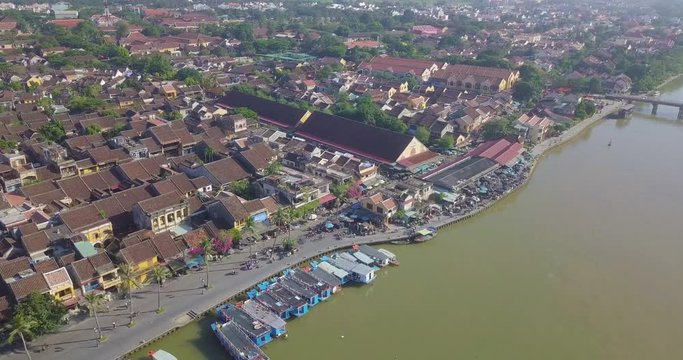 Panorama of Hoian market. Aerial view of Hoi An old town or Hoian ancient town in sunny day. Royalty high-quality free stock video footage top view of Hoai river and boat traffic in Hoi An market