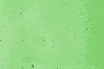 Green pocked texture of a cement wall in the street