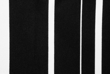 Black and white stripes fabric cloth background, texture. Vertical lines , parallel.  