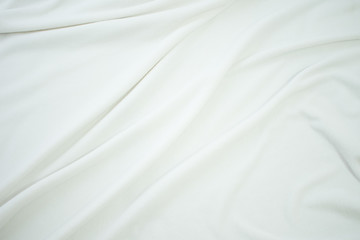 Obraz na płótnie Canvas white crumpled blanket, texture, top view