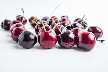 Fresh cherries on white background