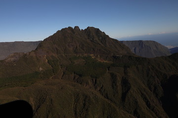 Top view of the mountains and the sky which is behind them