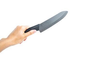 Female hand holding a fruit knife