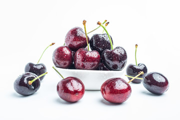 Fresh cherries on white background