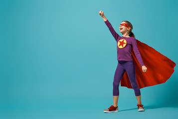 child playing superhero © Konstantin Yuganov