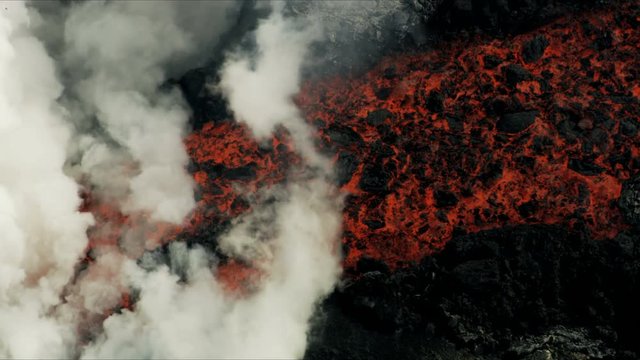Aerial view red hot magma ocean steam rising