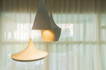 modern white shiny pendant light with white curtain modern house design