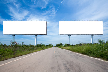 blank billboard on the sideway in the park. image for copy space, advertisement, text and object. white billboard in natural green.