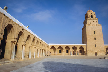 Fototapeta na wymiar Great Mosque of Kairouan courtyard with minaret in Kairouan city in Tunisia also known as Mosque of Uqba