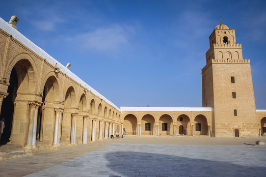 Great Mosque of Kairouan courtyard with minaret in Kairouan city in Tunisia also known as Mosque of Uqba