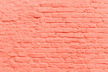 Living coral color brick stone wall background texture