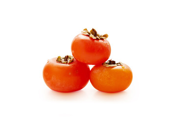 three ripe juicy fragrant fruit persimmon