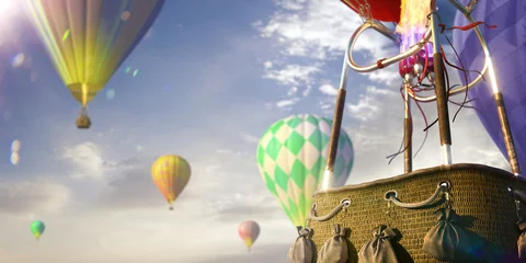 Foto op Canvas Empty basket hot air balloon beautiful background © Anna Stakhiv