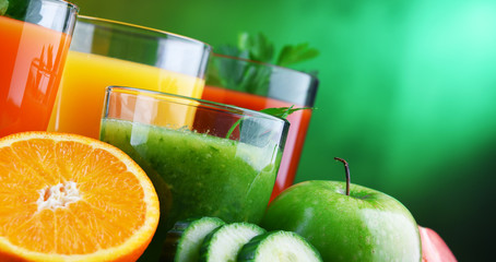 Glasses with fresh organic vegetable and fruit juices