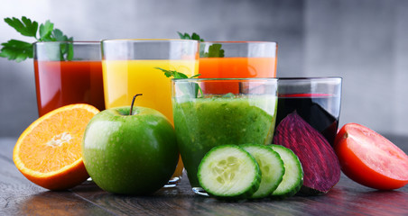 Glasses with fresh organic vegetable and fruit juices