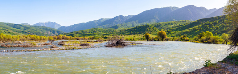 Panorama of a mountain valley with a river