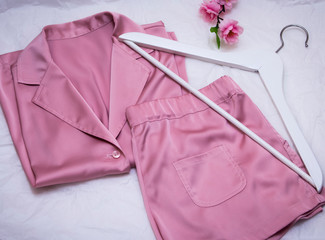women's silk pink pajamas with hanger and flowers