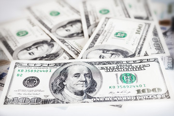 American dollar bills on a white background, money