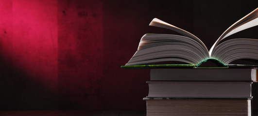 Composition with open book on the table