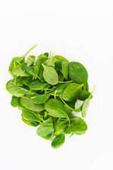 Fresh green leaves spinach isolated on a white background. Healthy and detox concept.