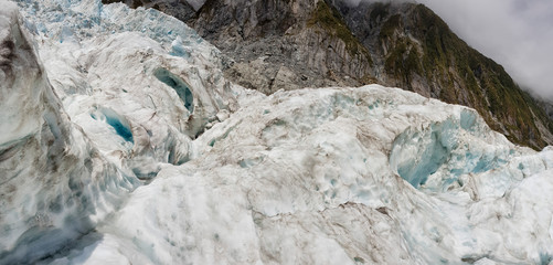 Franz Josef Glacier crampons hike through the blue glacier ice - New Zealand, South Island, NZ