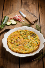 omelette with bacon and zucchinis