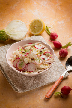 mixed salad with fennel radish lemon and pink pepper