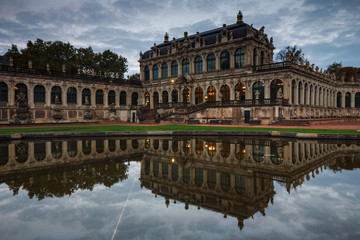 Fototapeta premium Zwinger Palace in historical center of the old city of Dresden, built in Baroque style. Sightseeing tour. Saxony. Landmarks of Germany. Top tourist attraction in Europe.