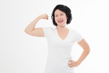 Strong middle age woman showing her muscularity and looking at camera isolated on white. Copy space and blank template summer t shirt. Mock up Mother day