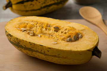 Halved raw spaghetti squash
