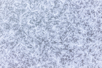 Abstract background, texture of snowflakes on ice
