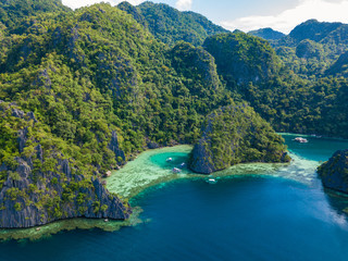 Fototapeta na wymiar Aerial view of beautiful Twin lagoon and limestone cliffs on Coron island, Palawan, Philippines.