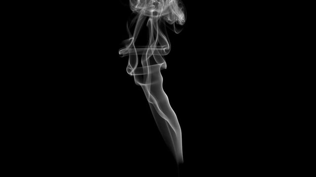 Magic Twists of White Smoke. White clearly expressed smoke slowly rises from the bottom of the screen and forms elegant twists on a black background. Filmed at a speed of 240fps