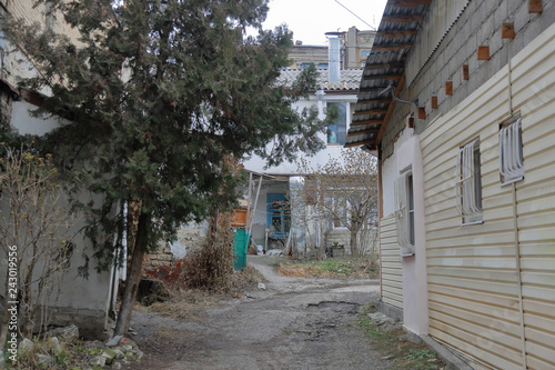Backyard Of A One Story Old Apartment Building In Small Town Backyard Of A One Story Old Apartment Building In Small Town
