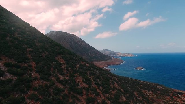 Aegean sea coast in Greece, Crete. Mountain and sea landscape. Livadi Beach in the village of Bali on the island of Crete Greece