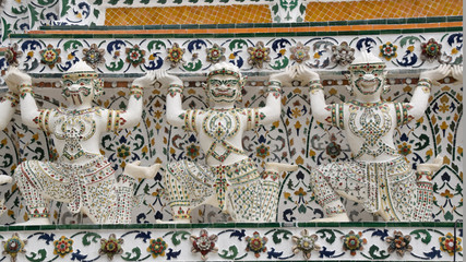 Row of figures that appear to hold up the temple of the dawn