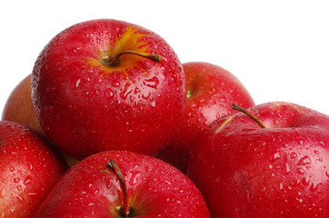 Red apples on white. Close-up