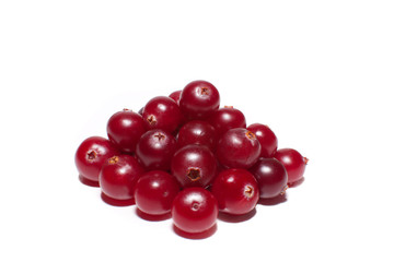 Pyramid of ripe cranberries isolated on white