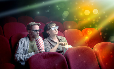 Fanciful couple watching miraculous part of a movie
