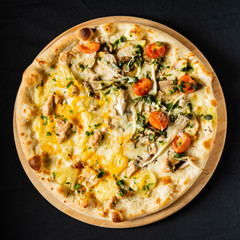 pizza on the black background