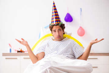 Young man celebrating his birthday in hospital