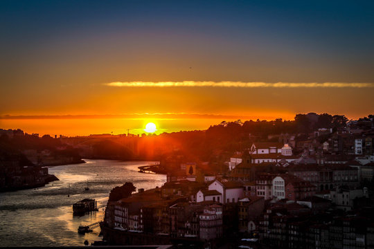 Sunset on river town, Portugal