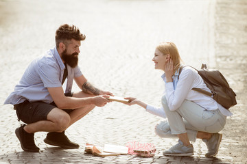 Sexual attraction. Couple in love on summer street. Hipster helping and looking at sexy girl....