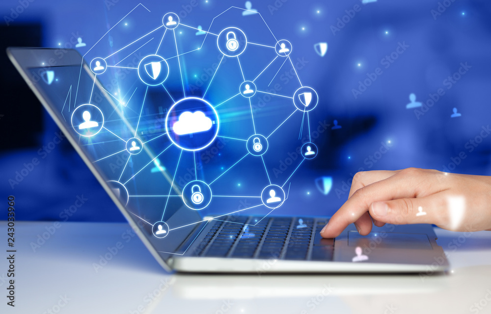 Poster Hand using laptop with centralized cloud computing system and network security concept
